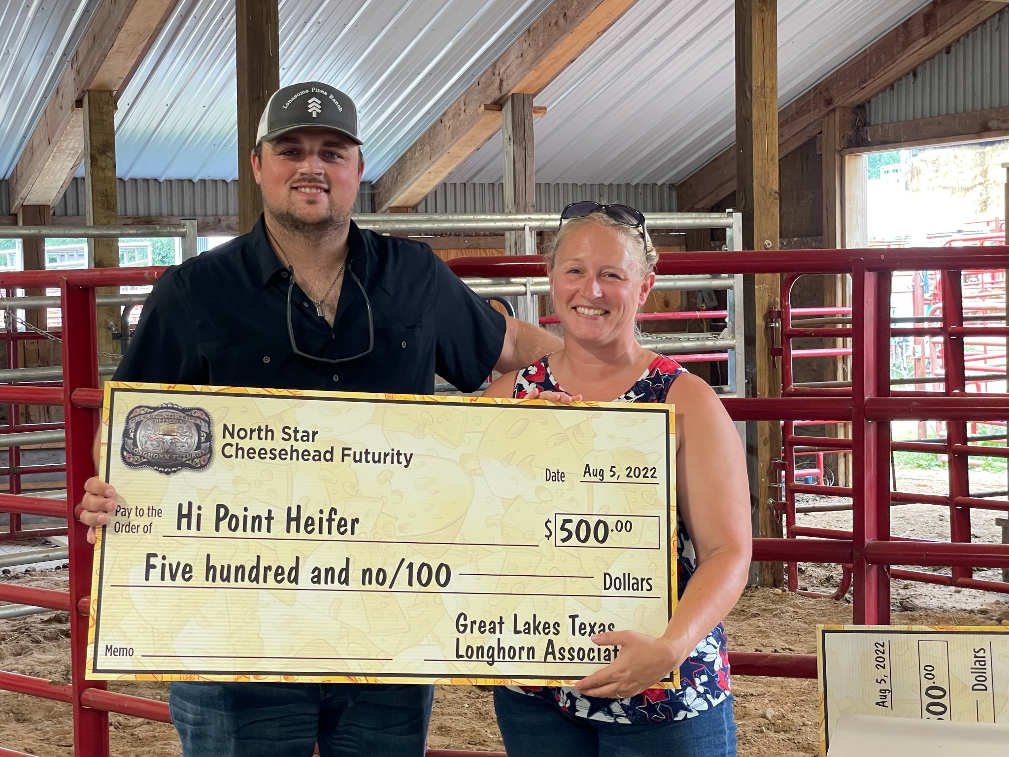 Hi Point Heifer winner and Hired Hand customer Dylan Skarpa, Lonesome Pines Ranch with sponsor and Hired Hand customer Missy Hicks, Hicks Texas Longhorns