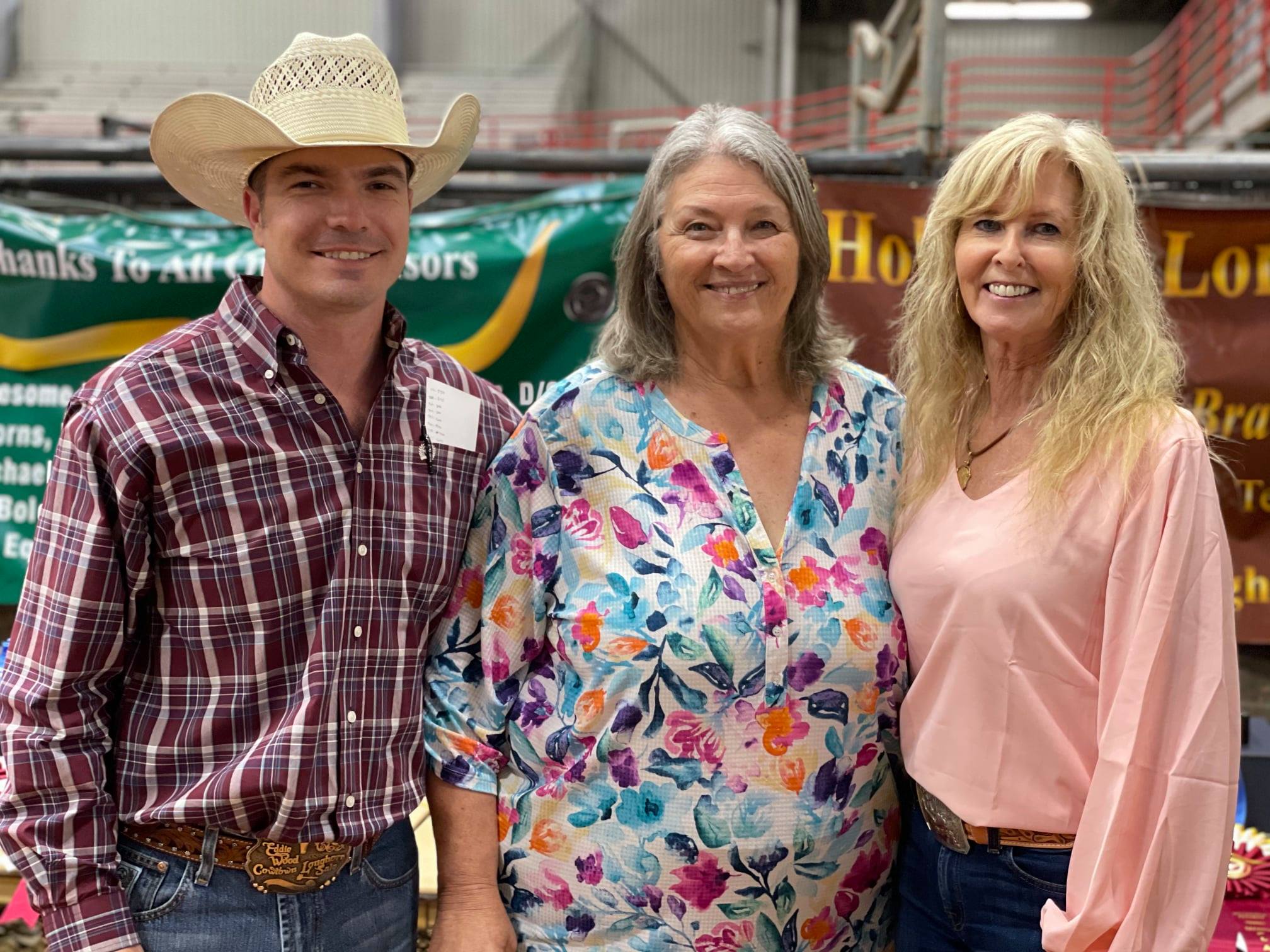 Hired Hand customers Bear Davidson, G&G Longhorns; Christy Randolph, Lonesome Pines Ranch; Ann Gravett, G&G Longhorns