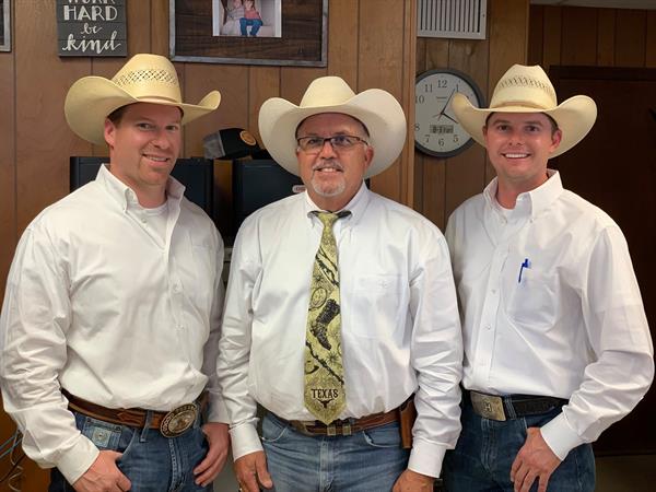 Auctioneer Joel Lemley with Ringmen Troy Robinett and Logan Harke