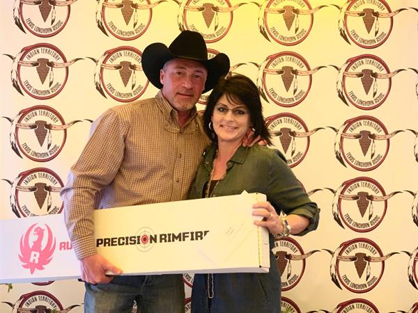Hired Hand customers, Futurity Winners and Sale Hosts Dale Hunt and Sherrill Caddel with Rockin H Longhrons