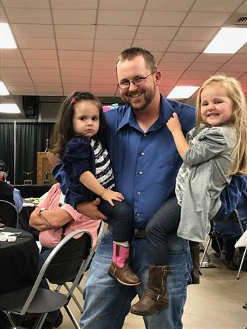 Justin Rombeck with his daughters
