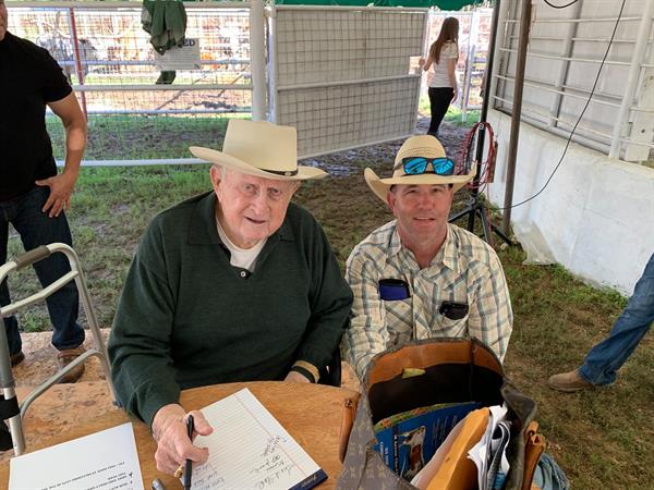 Red McCombs and ranch hand Chad Red McCombs and ranch hand Chad